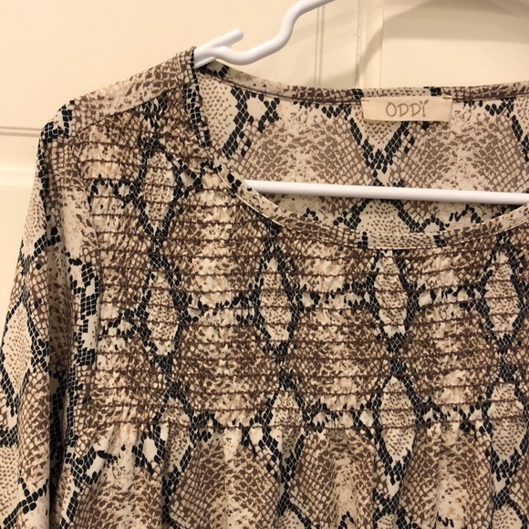 Printed blouse with smocking at wrist and across the front at neckline. - Picture 3 of 4